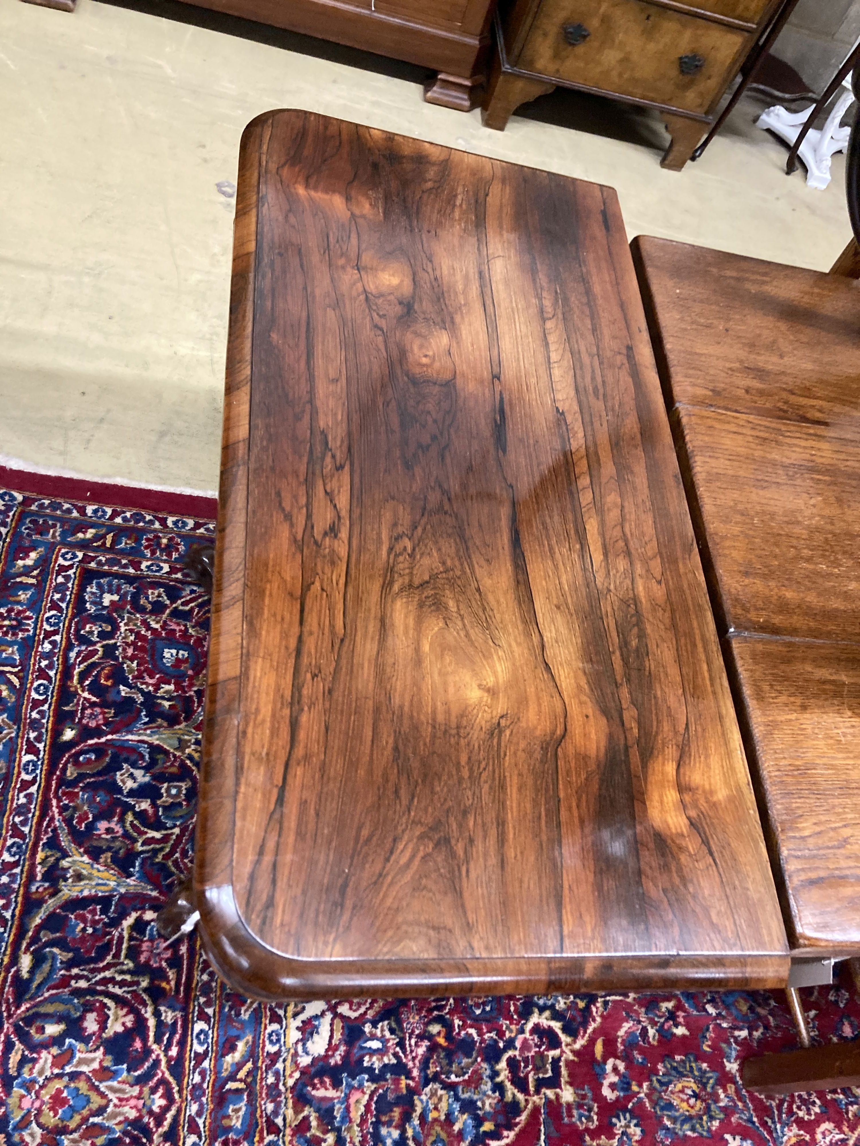 A mid Victorian rectangular rosewood folding tea table, width 92cm, depth 46cm, height 78cm